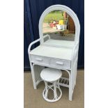 A modern white painted faux bamboo and caned dome topped mirrored dressing table with two drawers