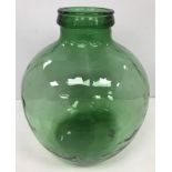 A Viresa green glass carboy style bottle 34 cm high
