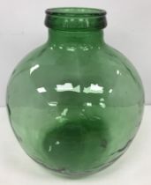 A Viresa green glass carboy style bottle 34 cm high