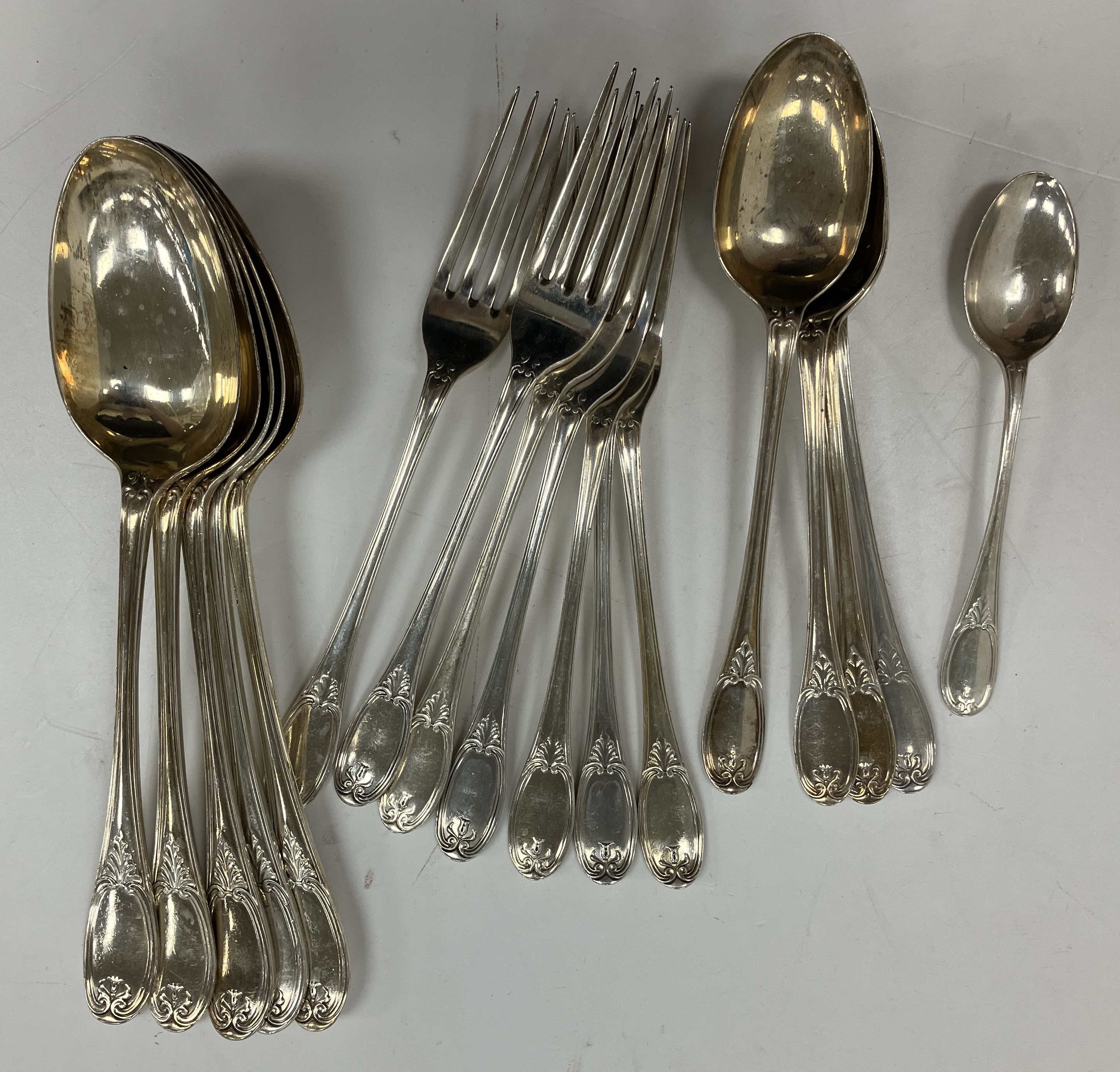 A George V silver Chippendale fancy pattern part canteen of cutlery by James Dixon & Sons of