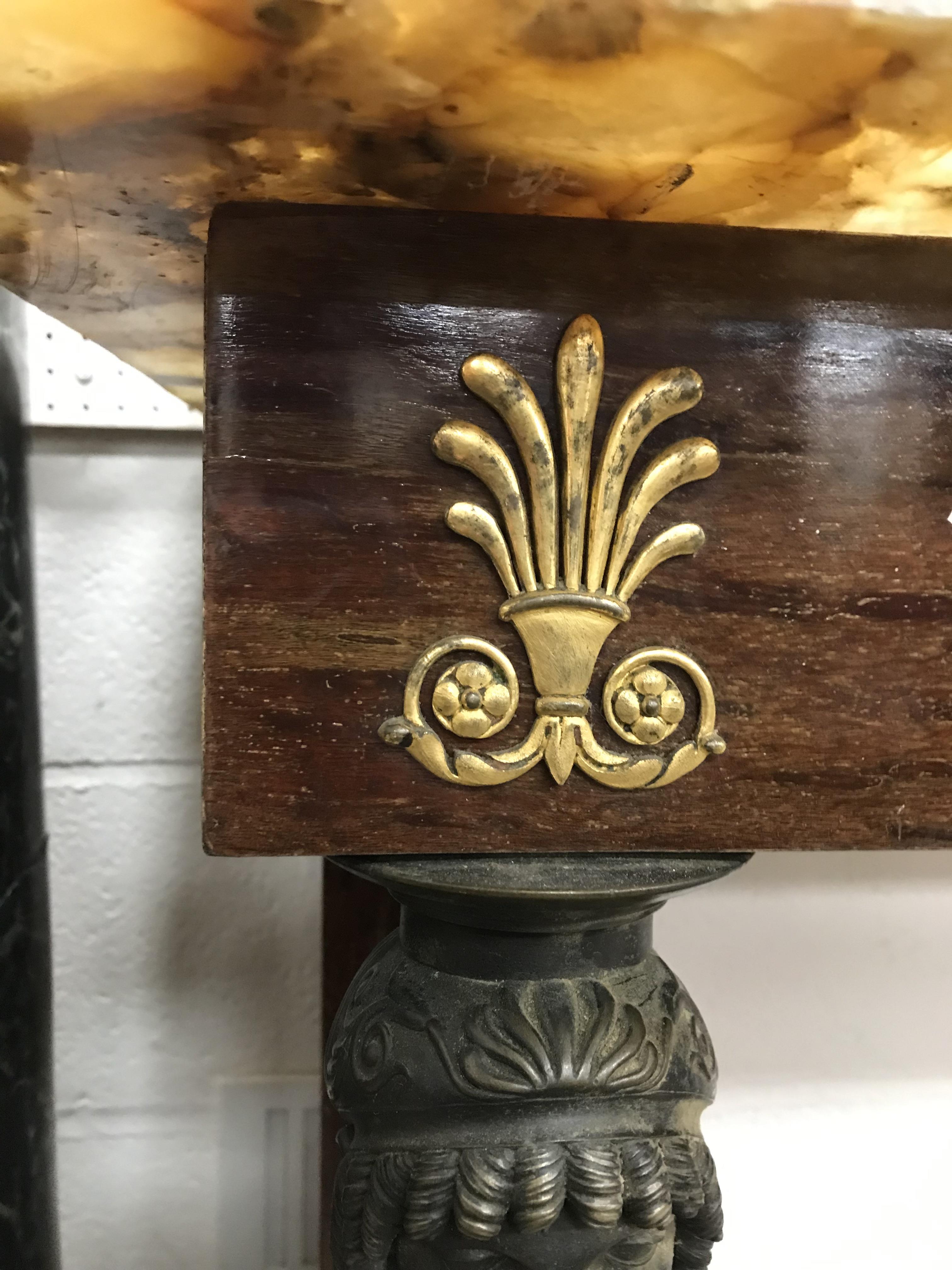 A mahogany console table in the French Empire taste, the brown agate top over a plain frieze, - Image 37 of 56