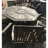 An octagonal teak garden table, 150 cm long x 150 cm deep x 70 cm high,
