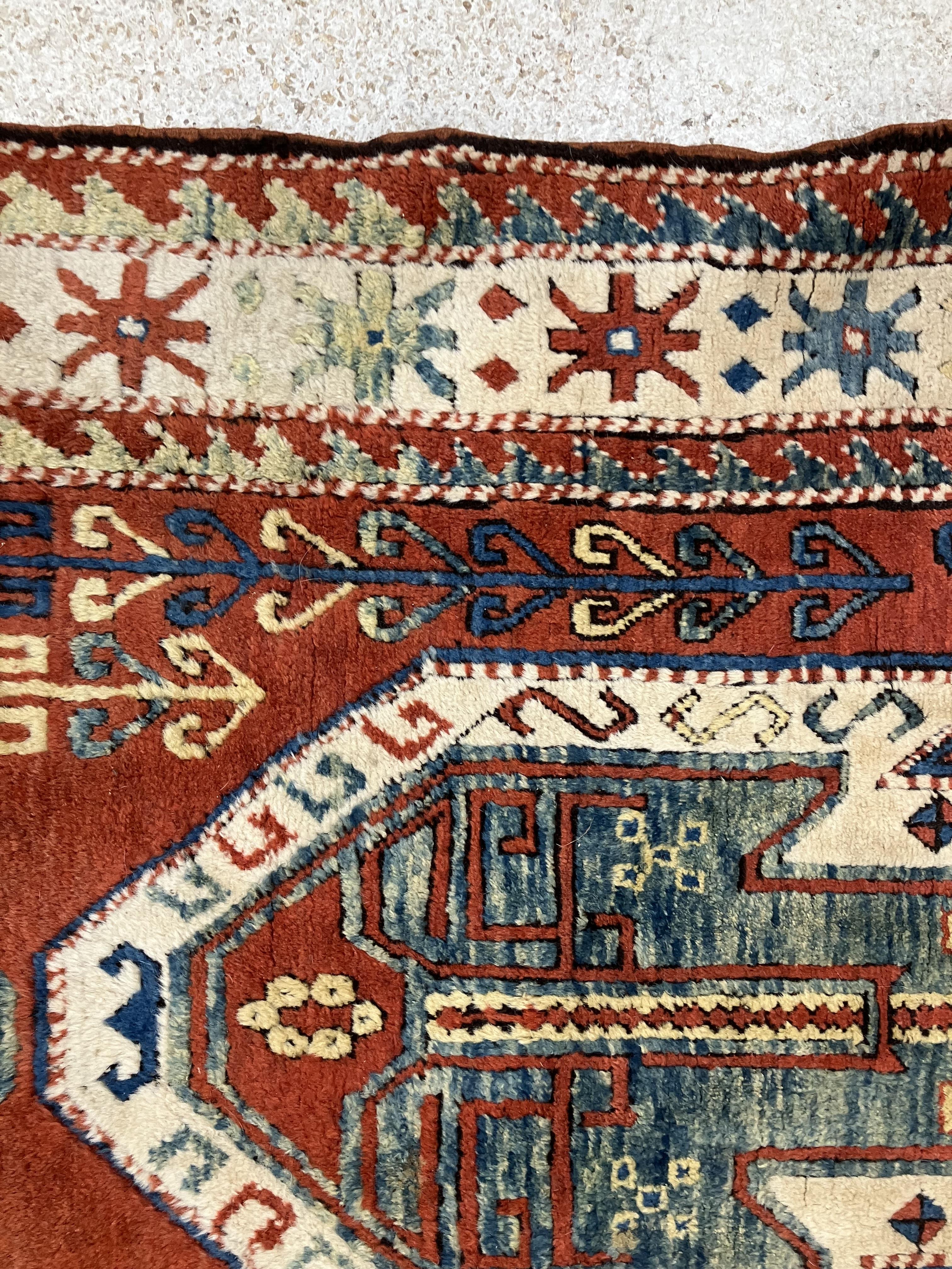 A fine Turkish carpet, - Image 10 of 16