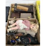 A box of various soft toys,