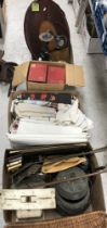 Two boxes containing various sundry items to include a plated table lamp,