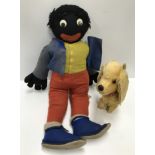 A felt covered soft "Golly" toy, 57 cm high and a Pedigree gold plush dog figure,