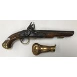 A George III flintlock pistol with straight grained walnut woodwork,