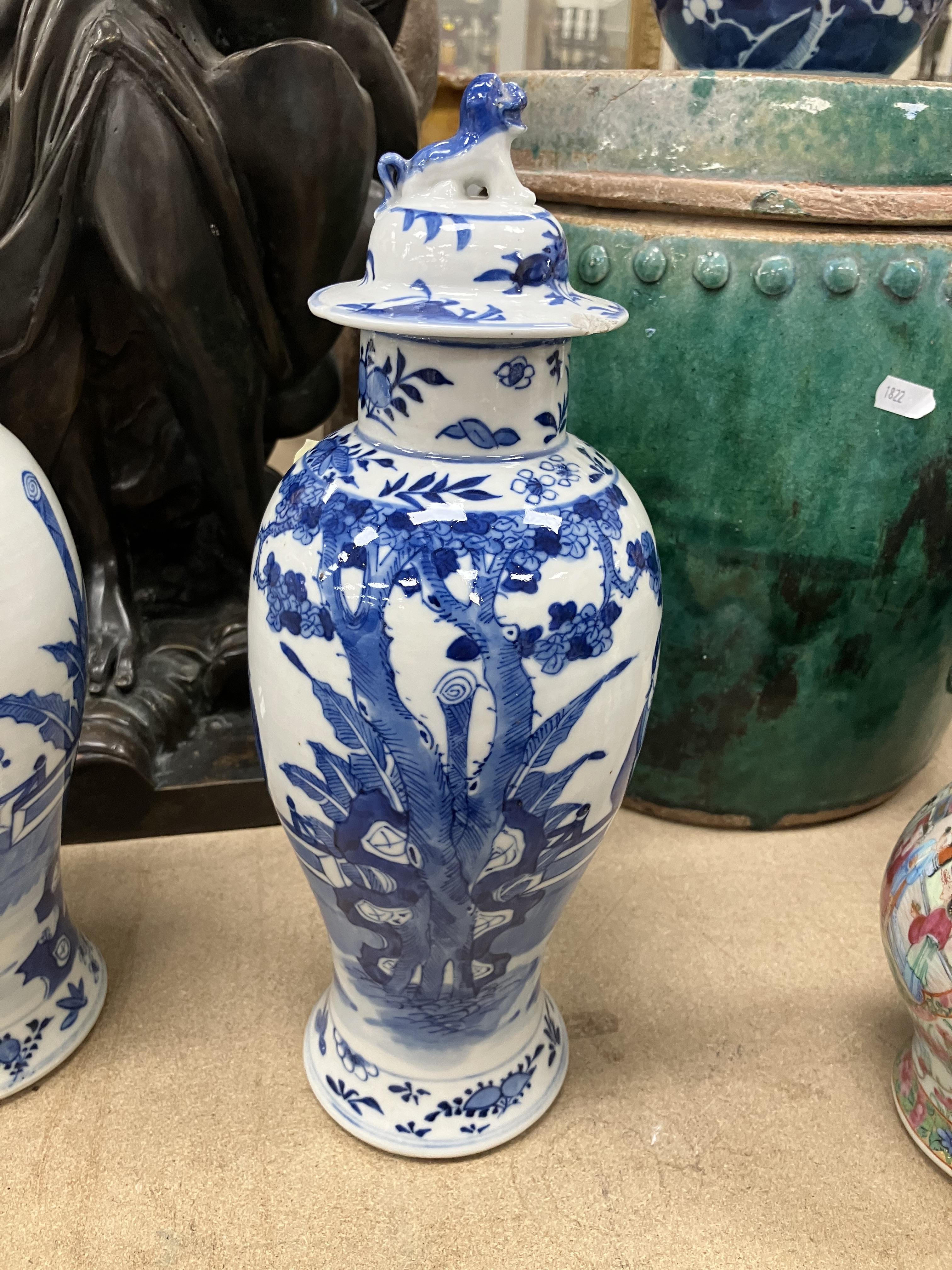 A pair of 19th Century Chinese blue and white baluster shaped vases and covers, - Image 31 of 54