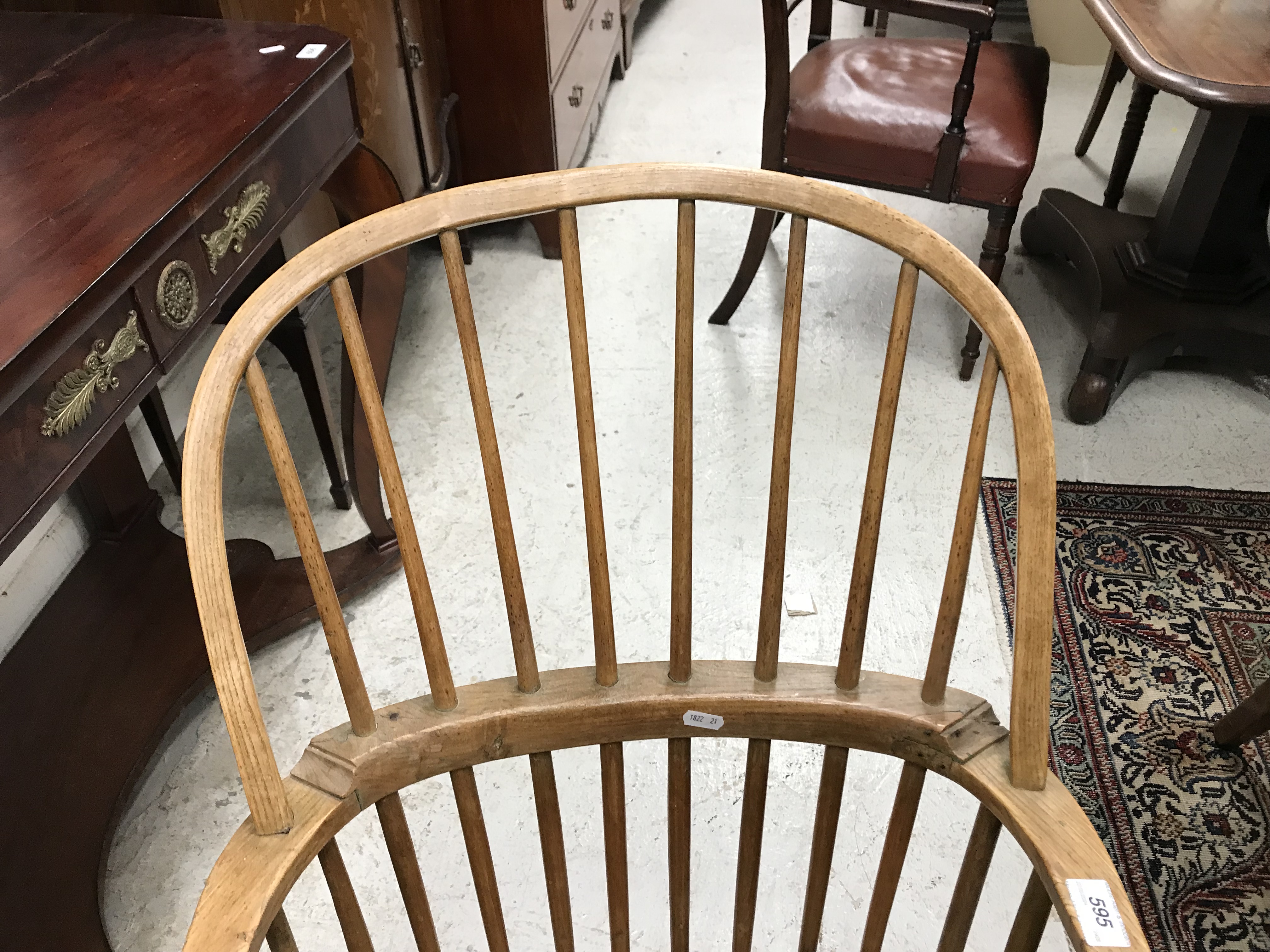 An early 19th Century West Country ash and elm stick back elbow chair, - Image 39 of 39