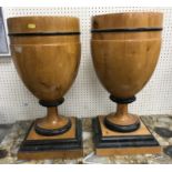 A pair of Amida maple and ebonised Biedermeier style urns after a circa 1850 Austrian design for
