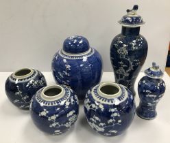 A collection of six Chinese prunus blossom decorated items including a baluster shaped vase and