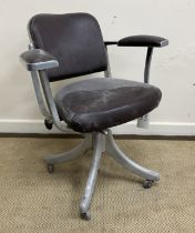 A vintage Tansad office chair with cast aluminium frame, burgundy leatherette upholstery,