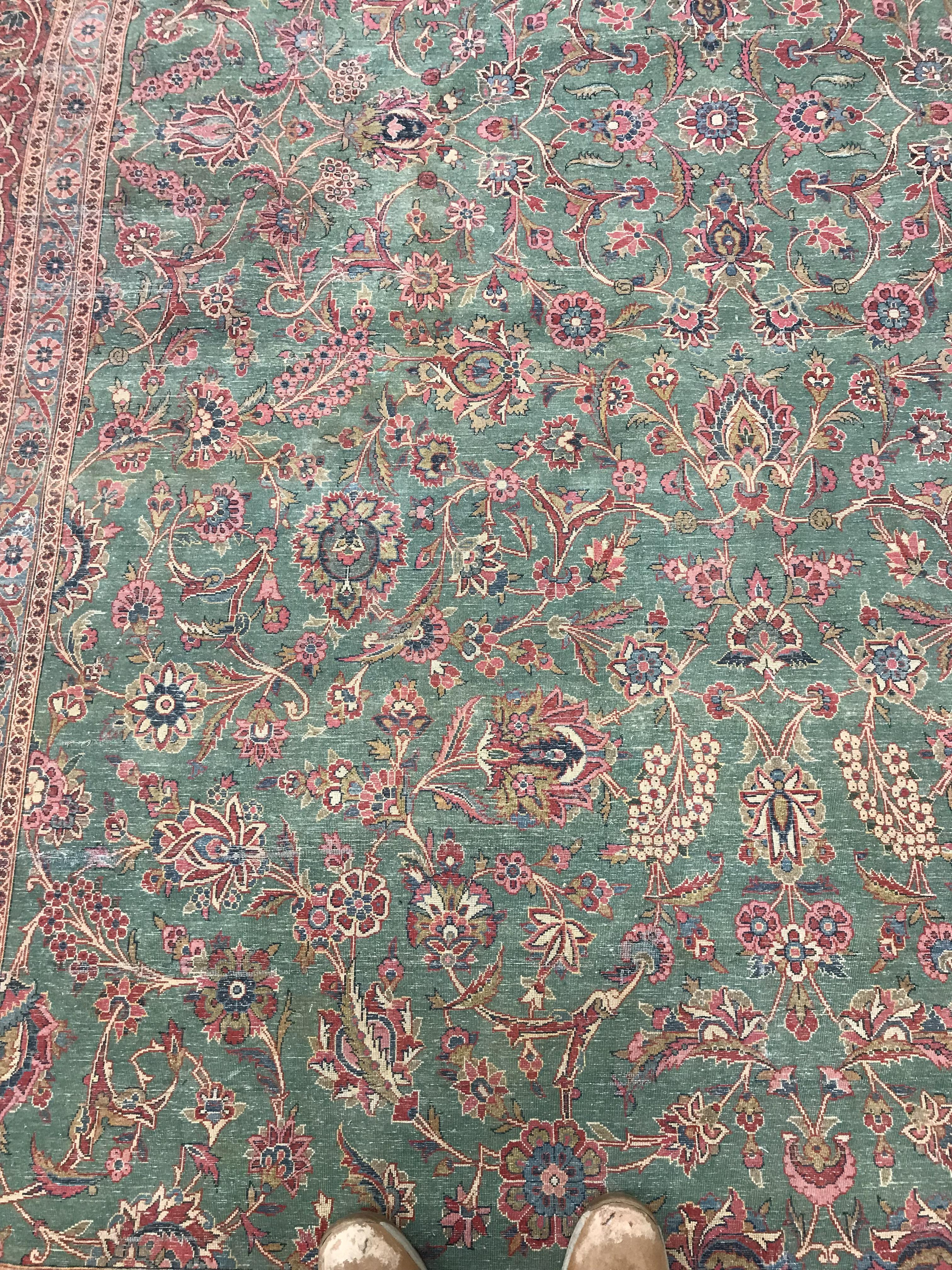 A Persian carpet, the central panel set with all-over scrolling foliate design on a teal ground, - Image 36 of 41