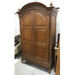 An And So To Bed mahogany wardrobe in the 18th Century French taste,