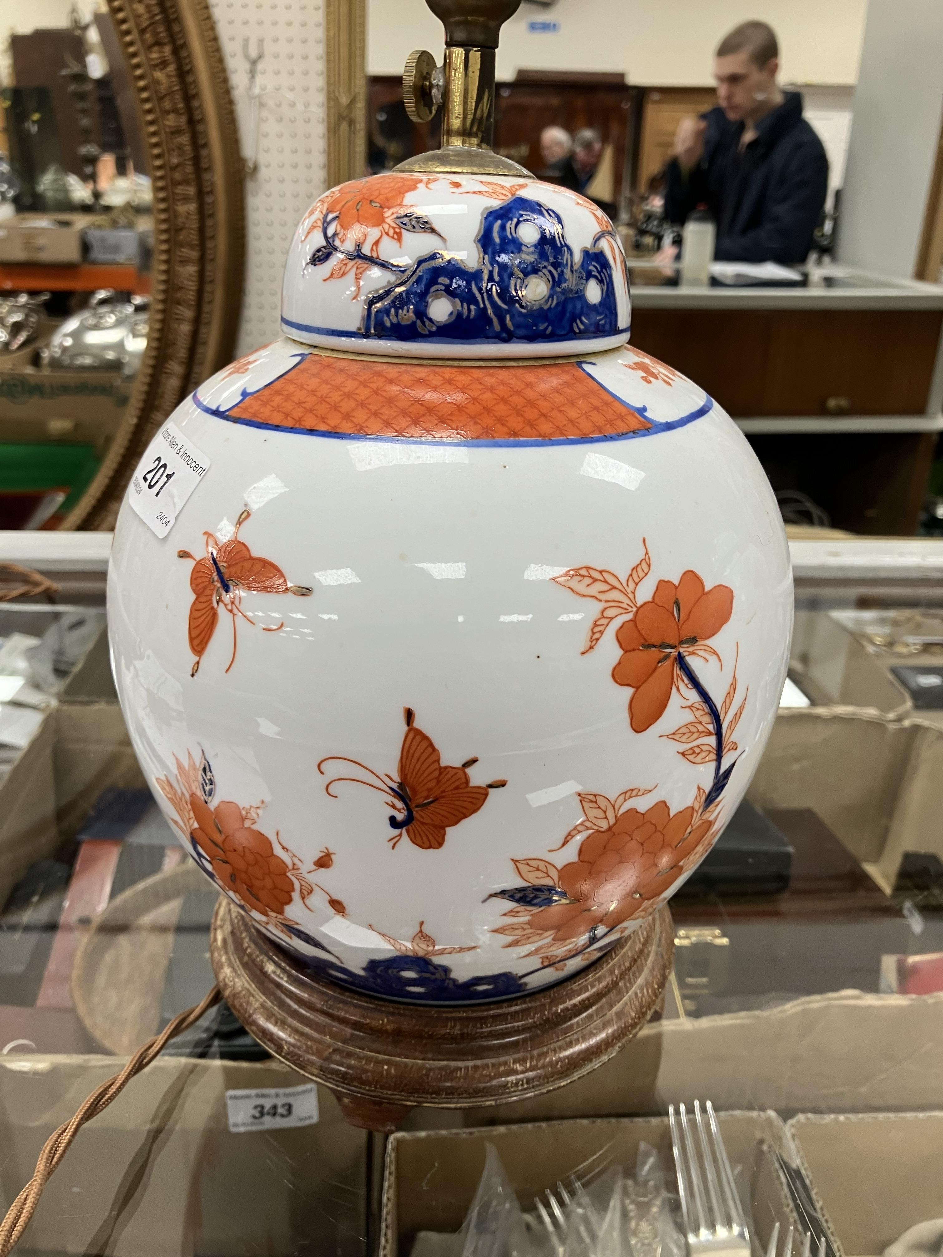 A pair of Japanese porcelain butterfly and flower decorated table lamps of ginger jar form in the - Image 5 of 32