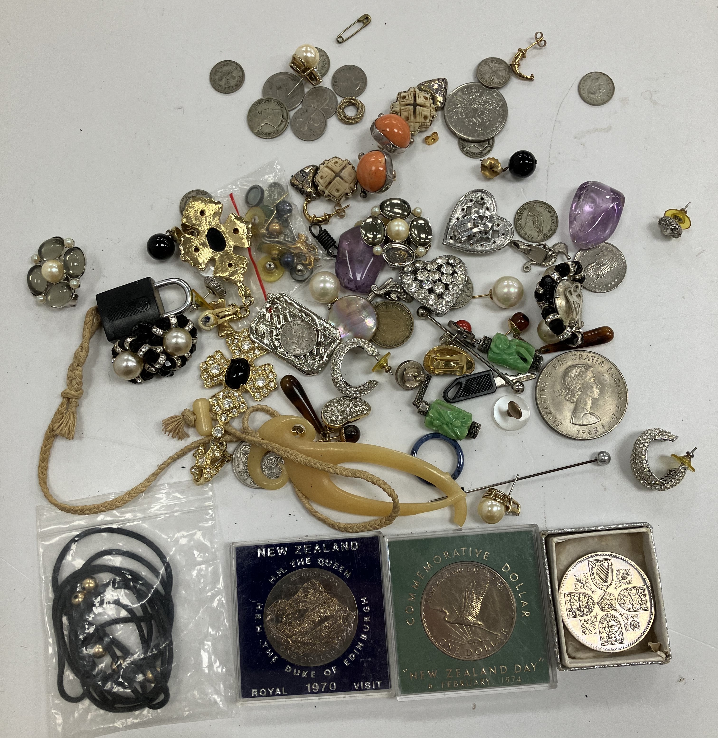 A small collection of various costume jewellery, earrings, pendants, coins,