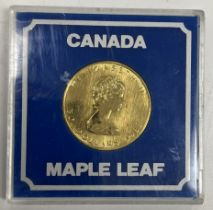A Queen Elizabeth II $50 1988 Canada fine gold 1 oz 99.99% gold coin, 31.
