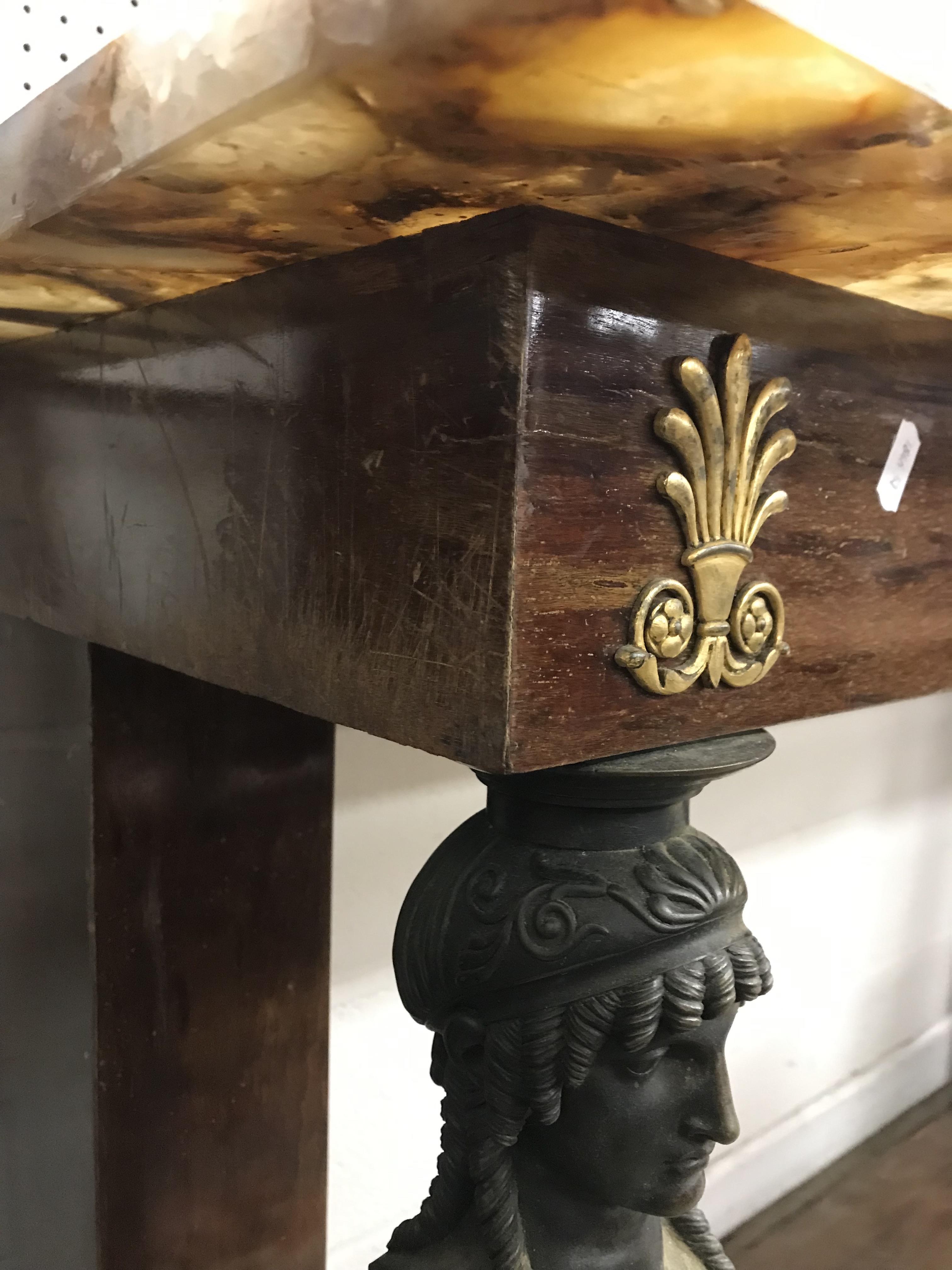 A mahogany console table in the French Empire taste, the brown agate top over a plain frieze, - Image 47 of 56