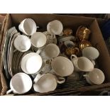 A box of various china wares to include plates, cups and saucers, etc.