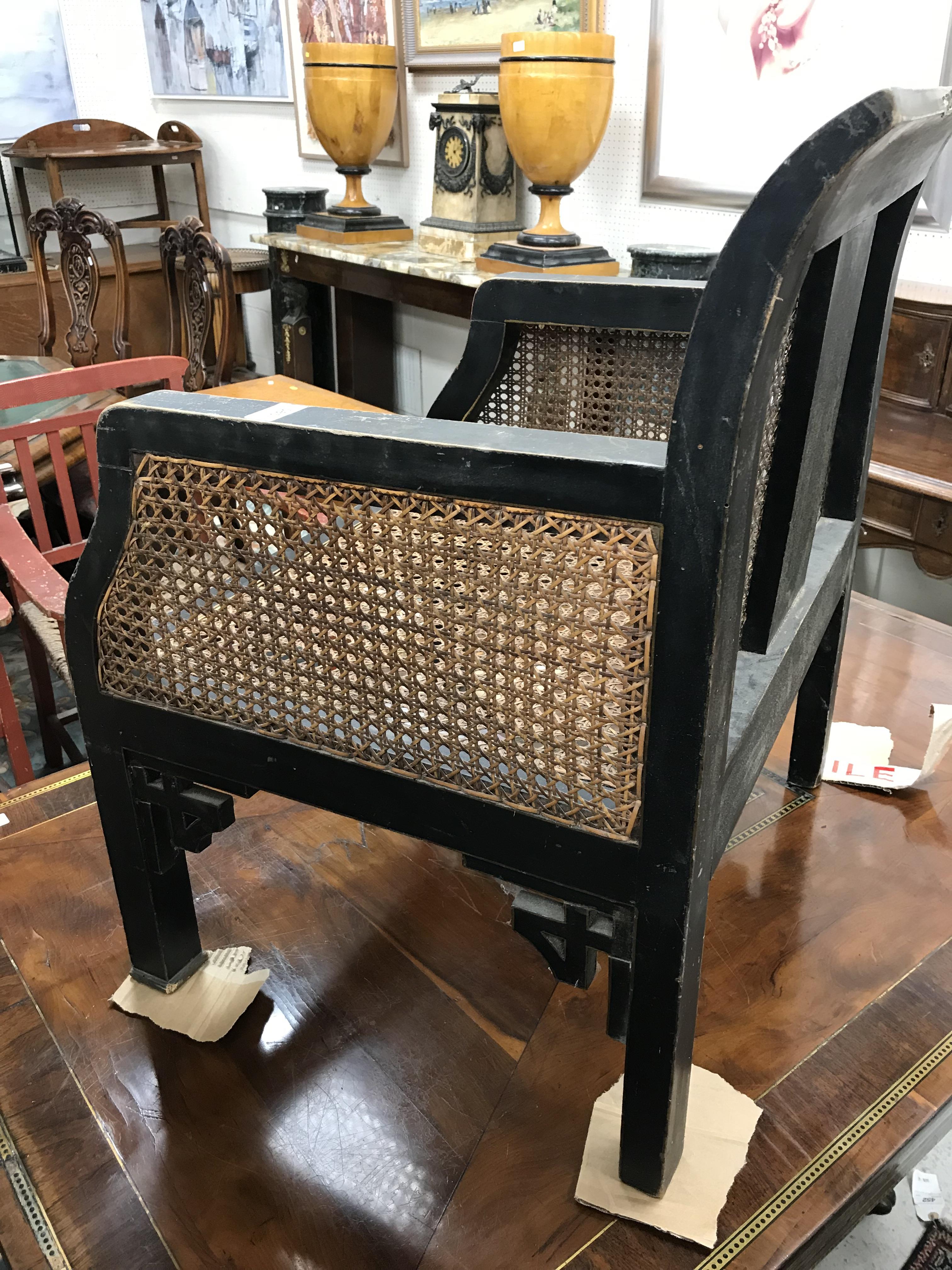 A pair of early 20th Century black lacquered and chinoiserie decorated caned low arm chairs on - Image 29 of 36