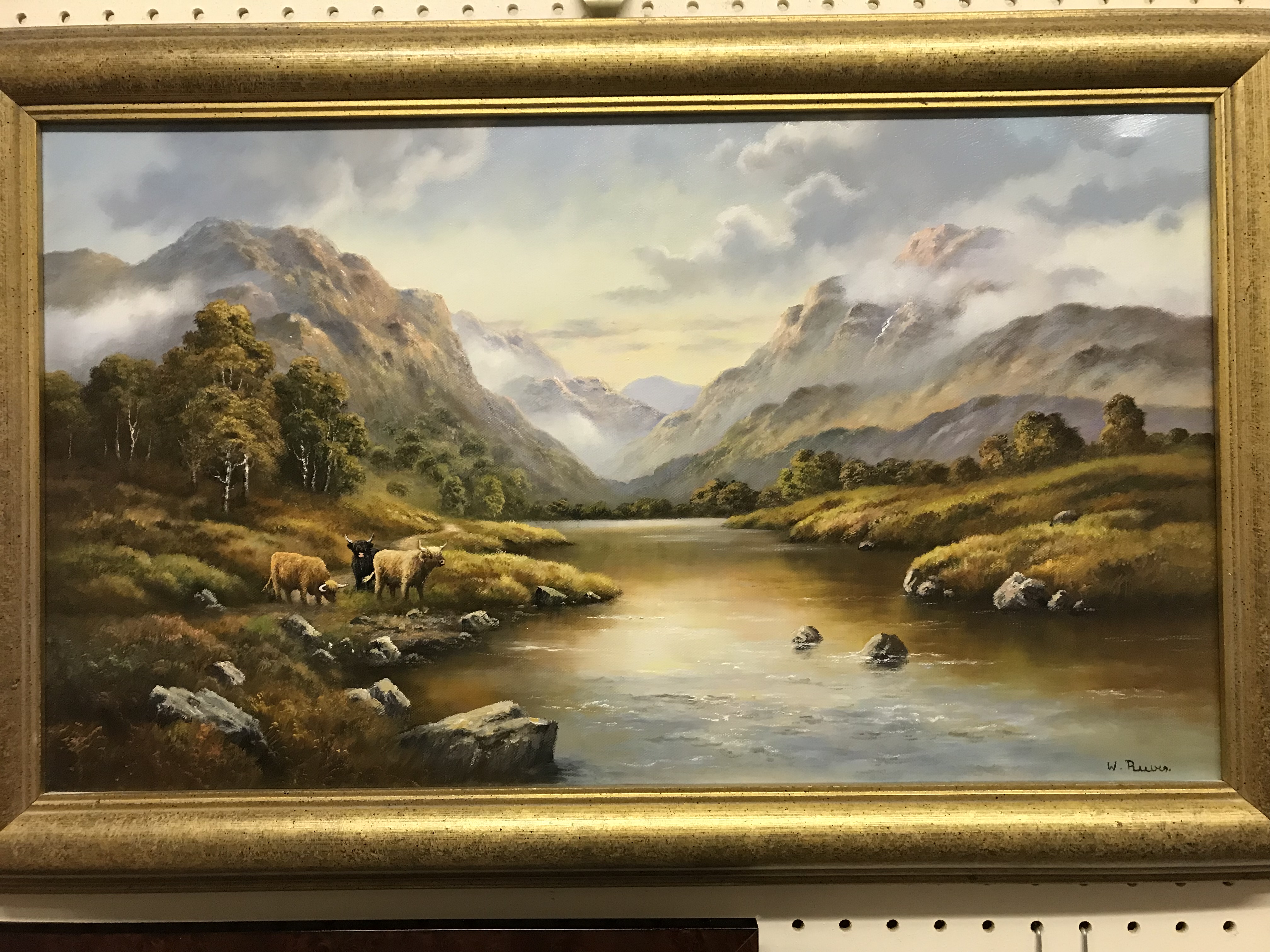 W. REEVES "Rural landscape with cows and river" oil on canvas, signed lower right, 36 cm x 61.