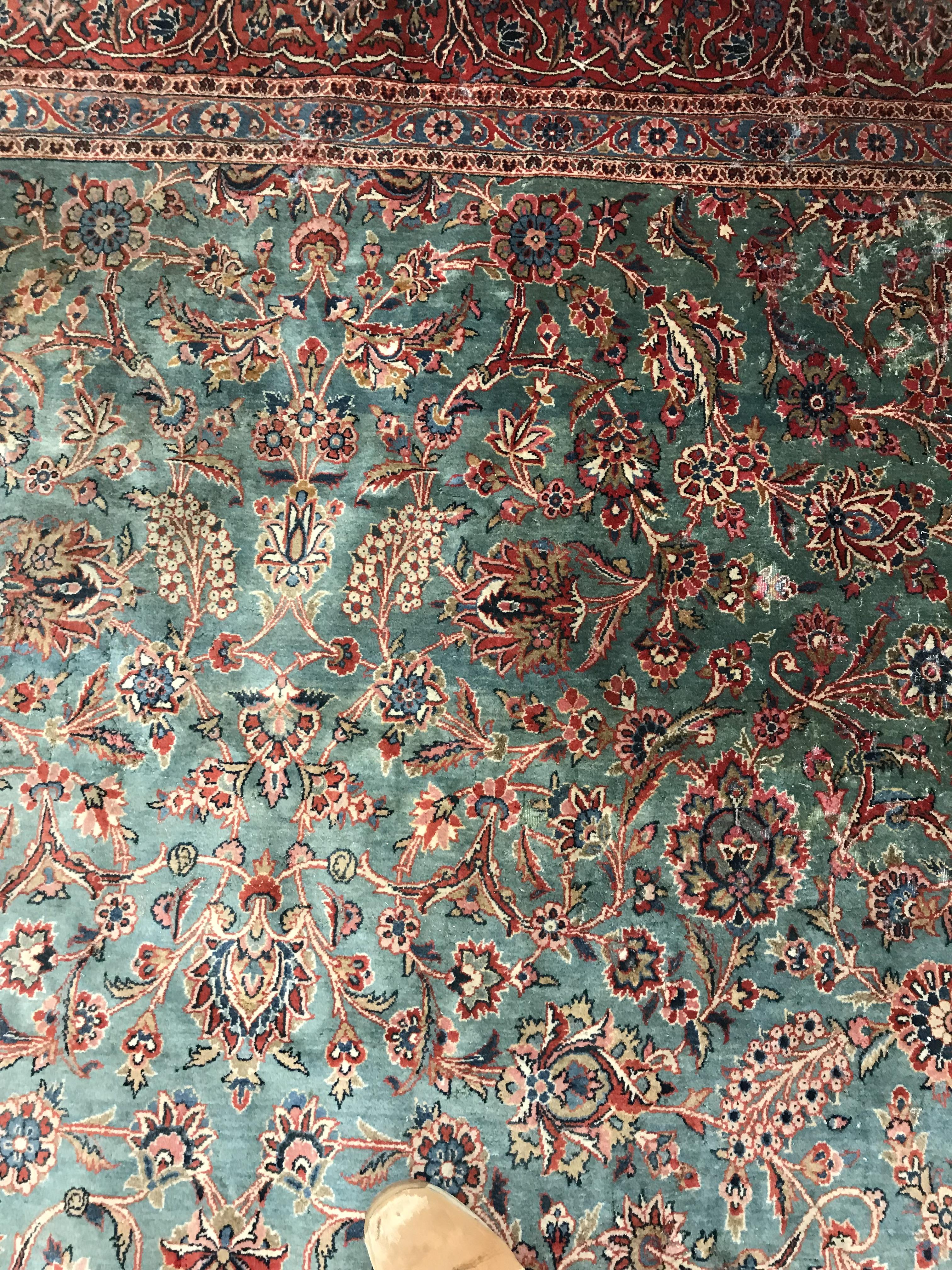 A Persian carpet, the central panel set with all-over scrolling foliate design on a teal ground, - Image 15 of 41