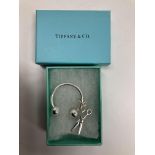 A Tiffany & Co. 925 silver keyring with scissors charm, 0.