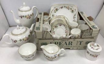 A Wedgwood "Mirabelle" pattern tea / coffee service comprising teapot, coffee pot, milk / cream jug,