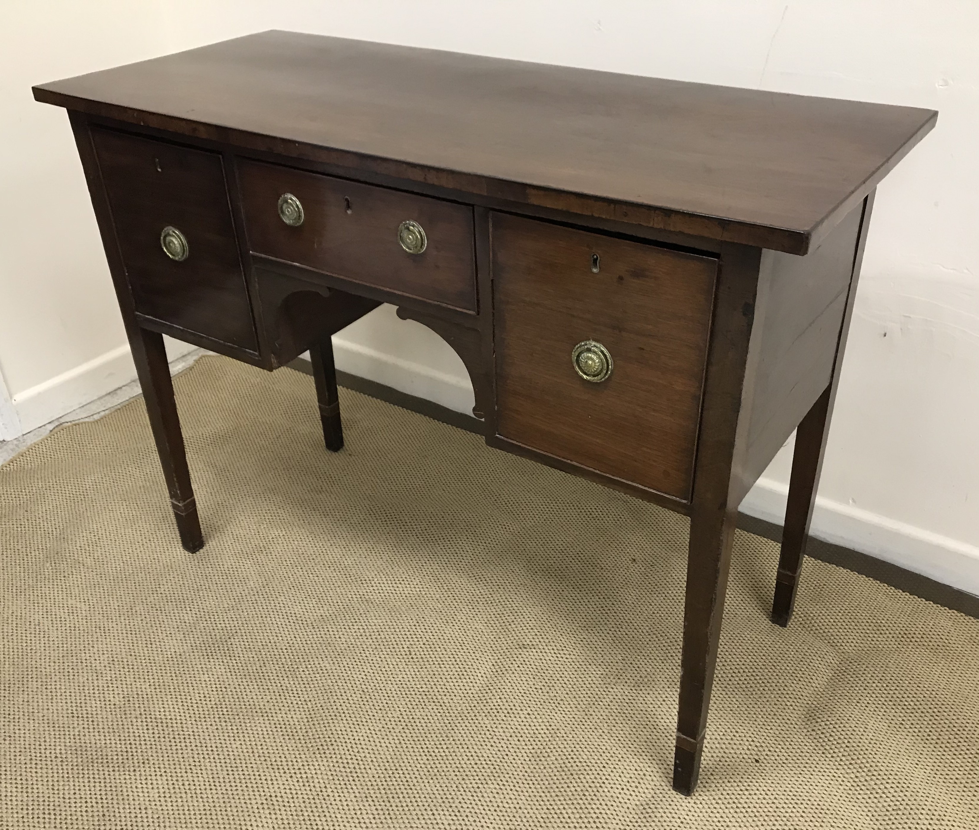 An early 19th Century mahogany sideboard,