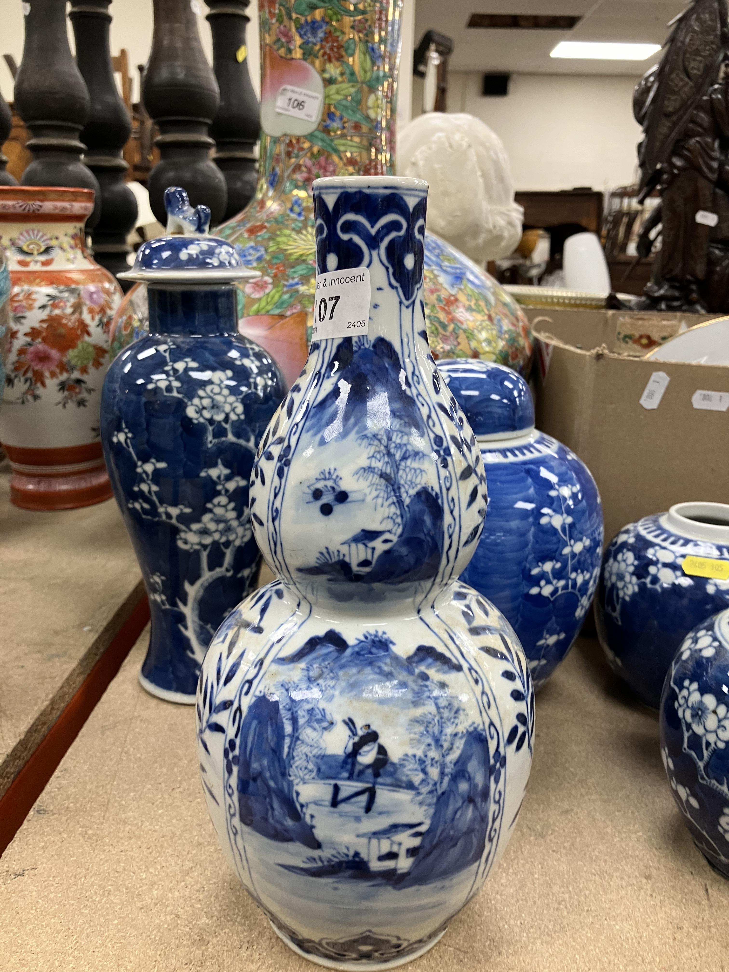 A Chinese blue and white double gourd shaped vase decorated with panels of figures in watery - Image 26 of 26