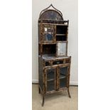 A Victorian bamboo framed side cabinet in the Aesthetic taste with black lacquered and Japanned