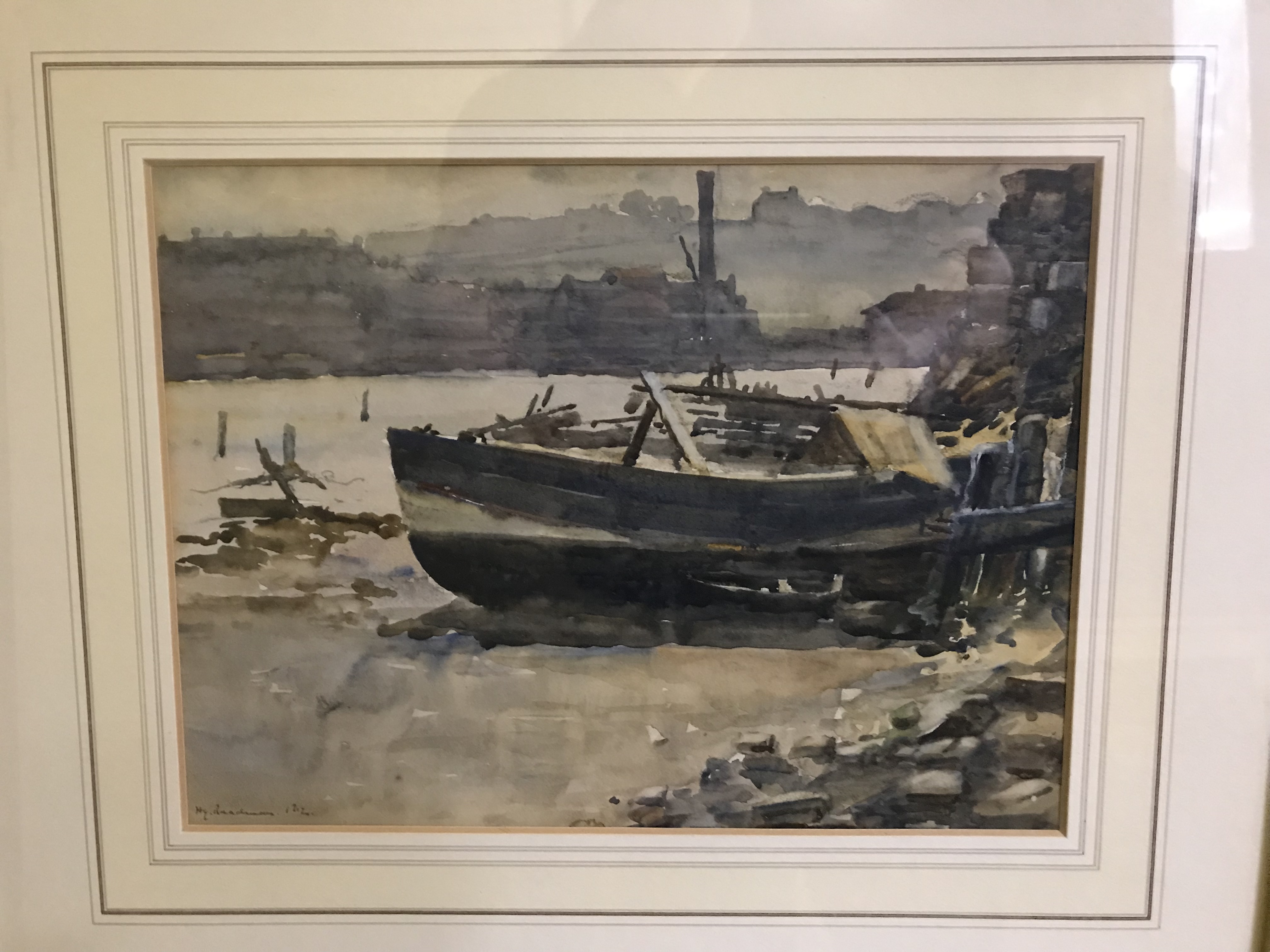 HENRY READMAN "Beached fishing boat by water's edge, factory in the background", watercolour,