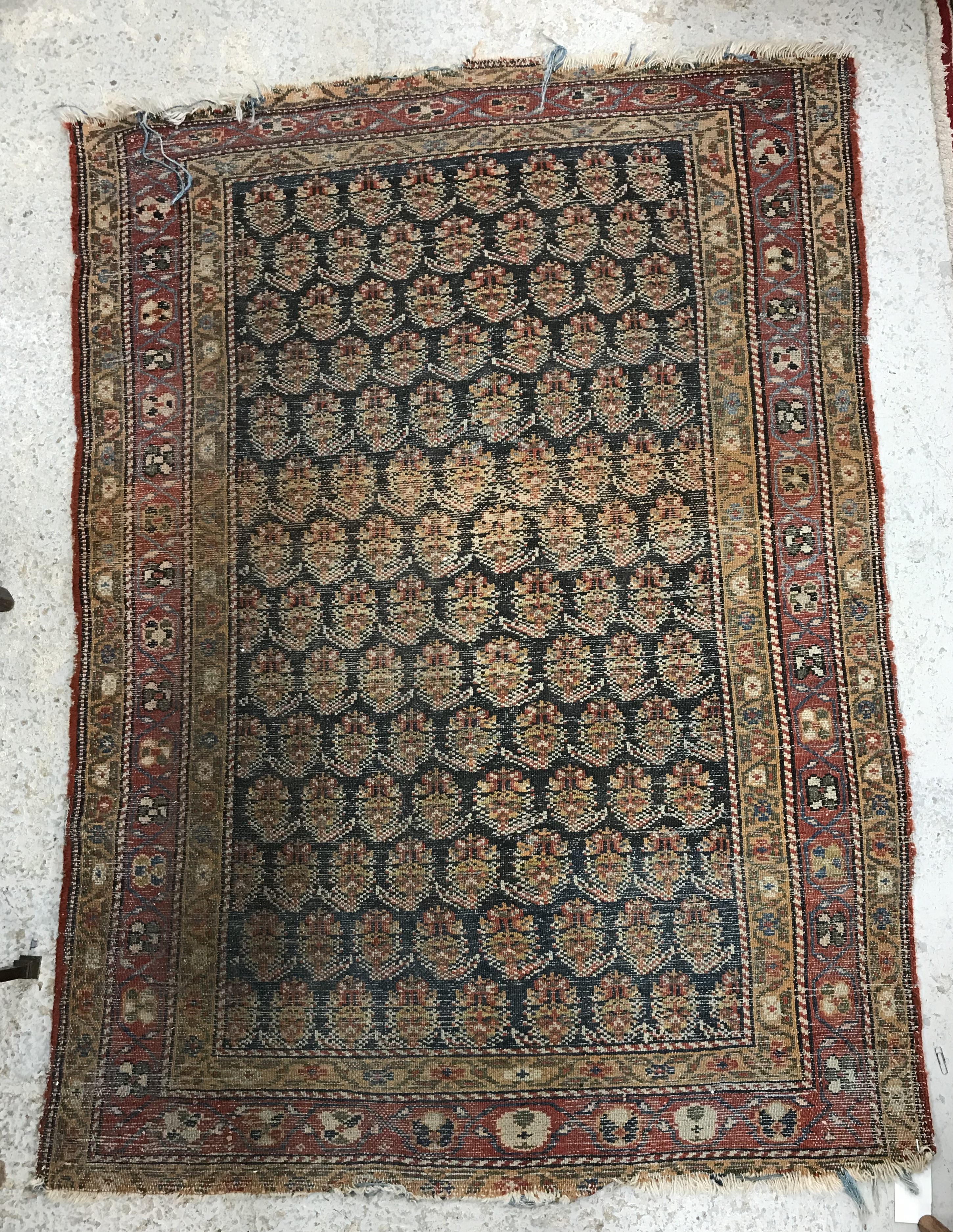 A Caucasian rug, the central panel set with stylised foliate design on a dark blue ground, - Bild 6 aus 6