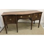A 20th Century mahogany and inlaid breakfront sideboard in the Sheraton style with single drawer