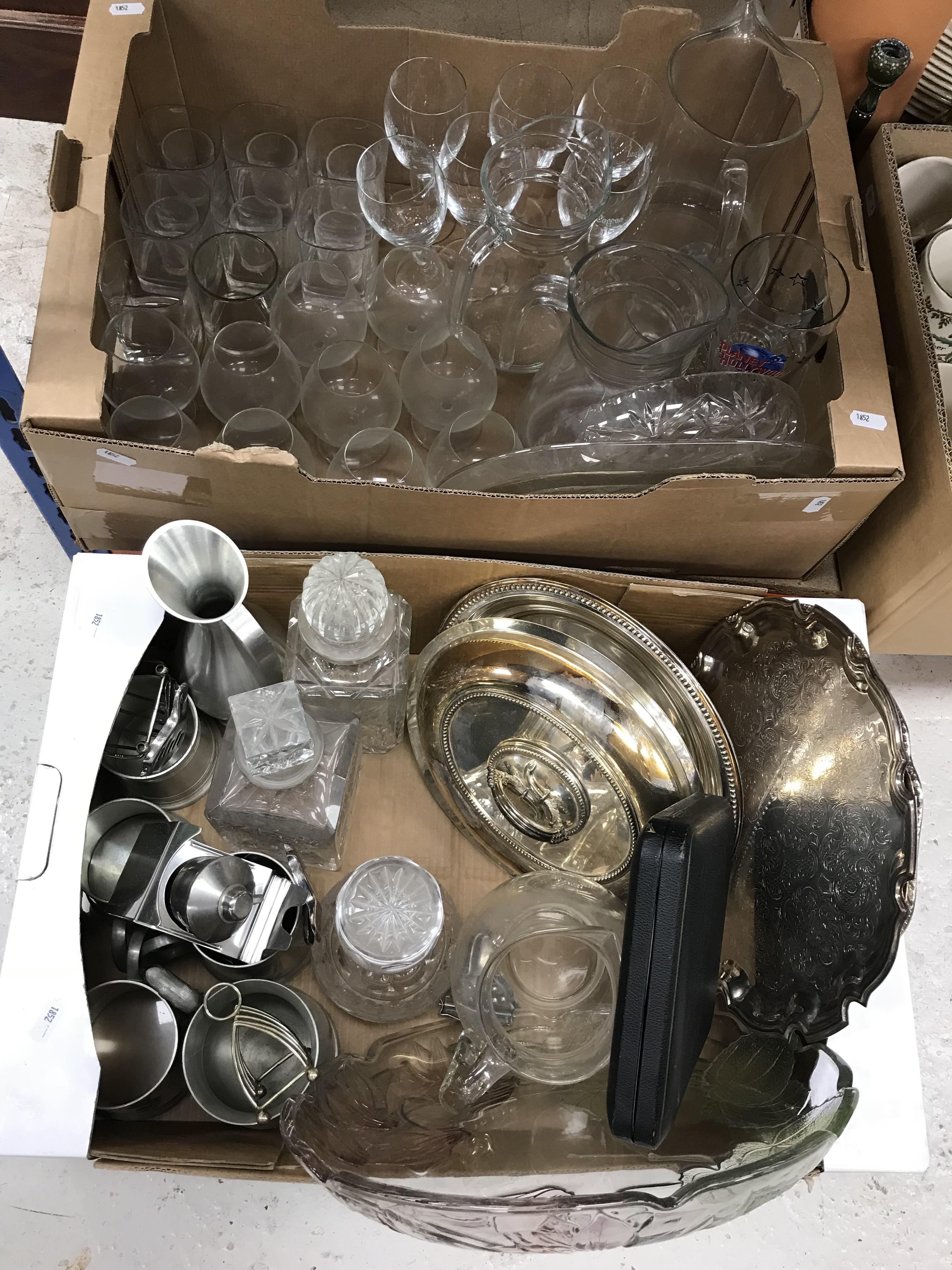 Two boxes of glassware to include wine glasses, lemonade jugs,