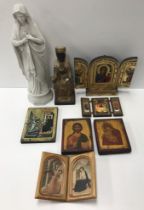 A box of various religious artefacts including a blanc de chine figure of "The Virgin Mary",