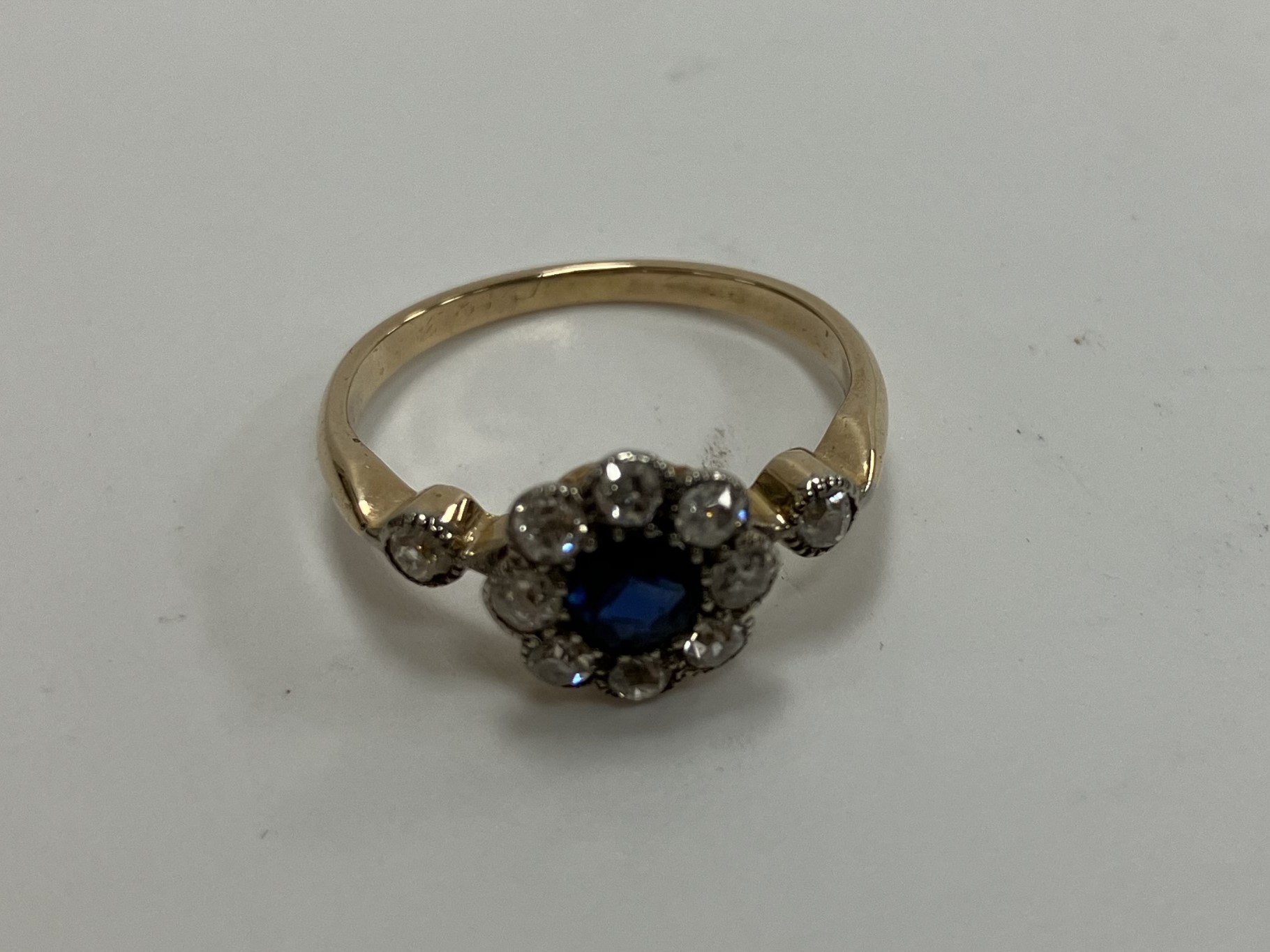 An early to mid 20th Century yellow metal mounted sapphire and diamond flower head dress ring, - Image 2 of 7