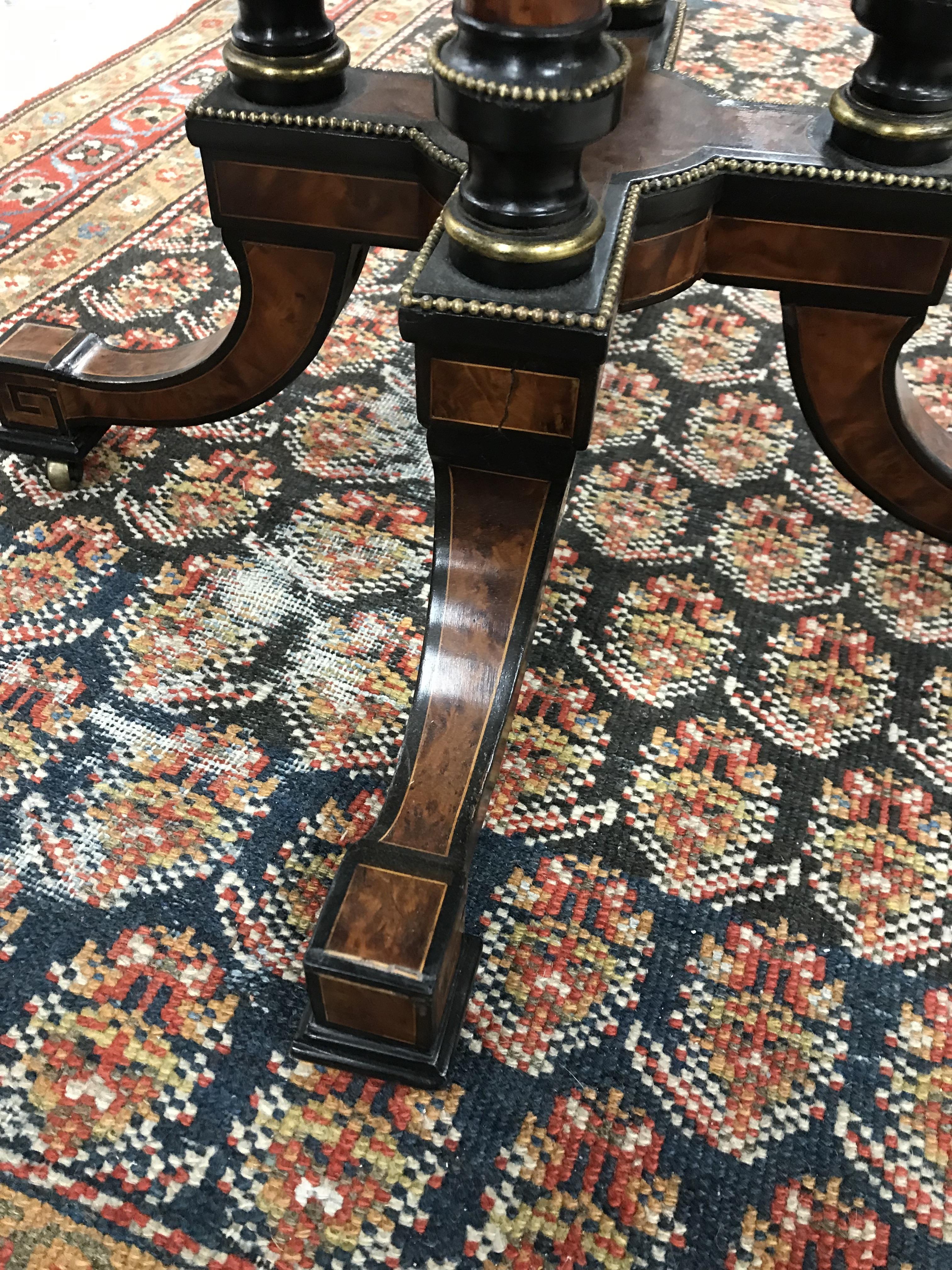 A Victorian amboyna and ebonised centre table, - Image 16 of 34