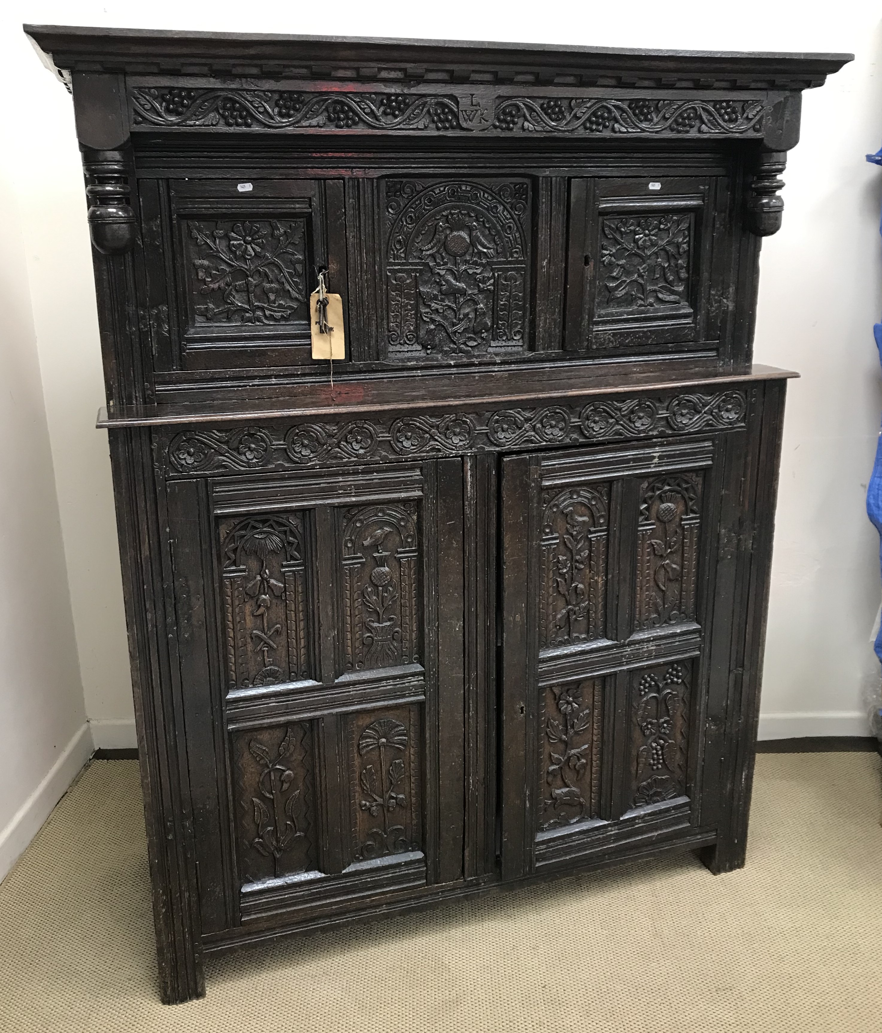 A 17th Century Lake District/Lancashire carved oak court cupboard,