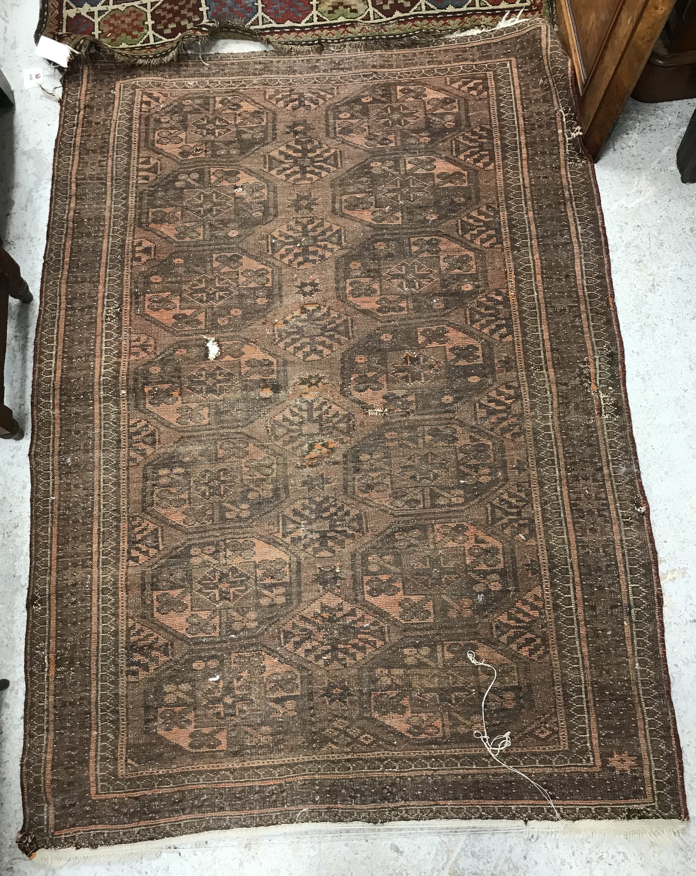 A Caucasian rug, the central panel set with stylised foliate design on a dark blue ground, - Bild 2 aus 6