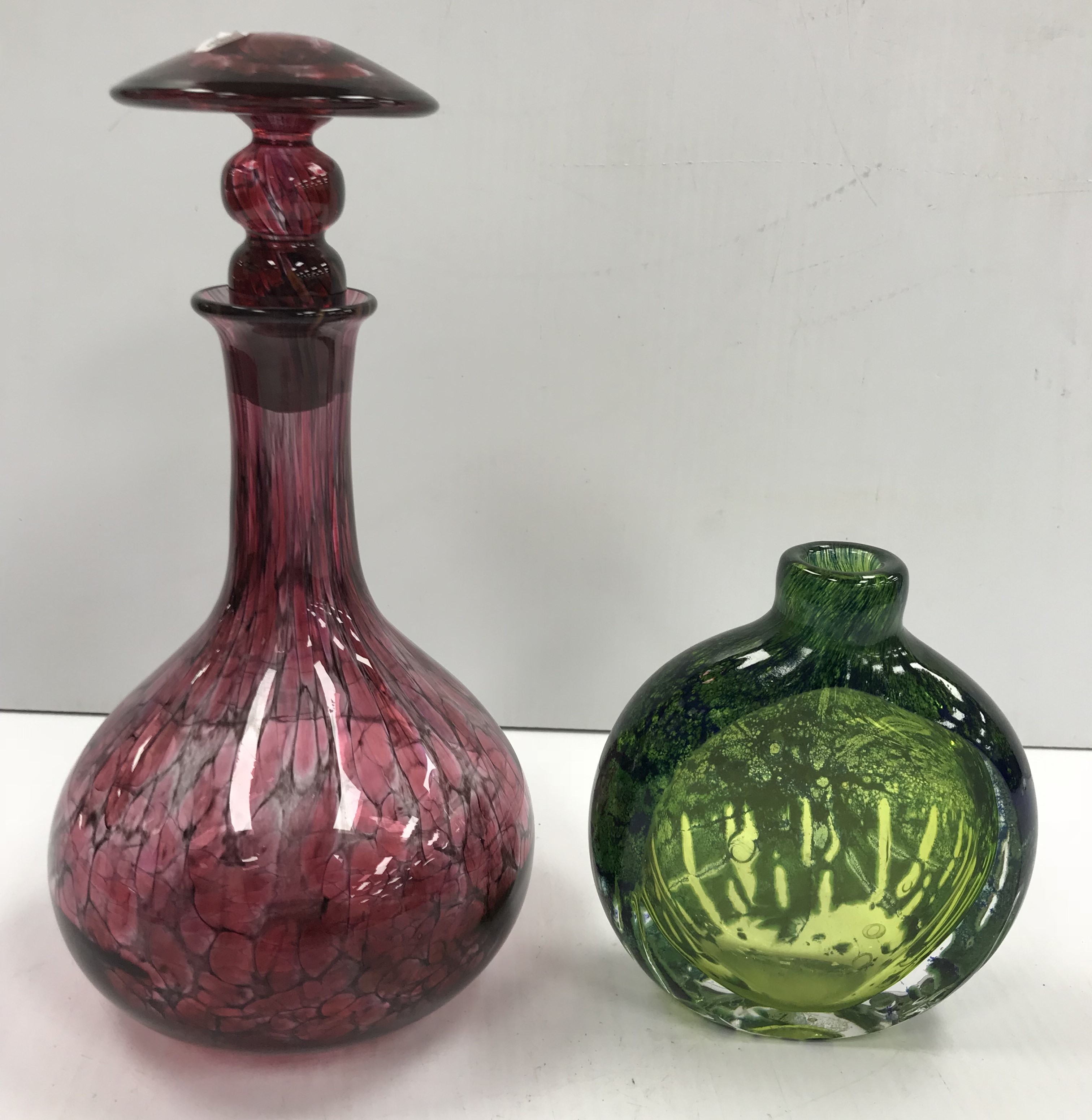 A Laugharne glass mottled pink onion shaped decanter and compressed mushroom stopper,