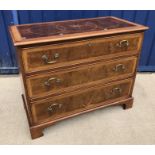 A walnut and parquetry inlaid chest in the early 18th Century style,