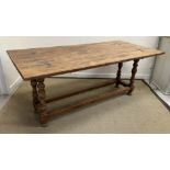 A modern oak dining table in the 17th Century manner,