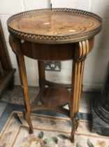 A kingwood and marquetry inlaid occasional table in the Louis XVI taste,