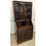 A mid to late 20th Century Danish mahogany secretaire bookcase in the manner of H W Klein for