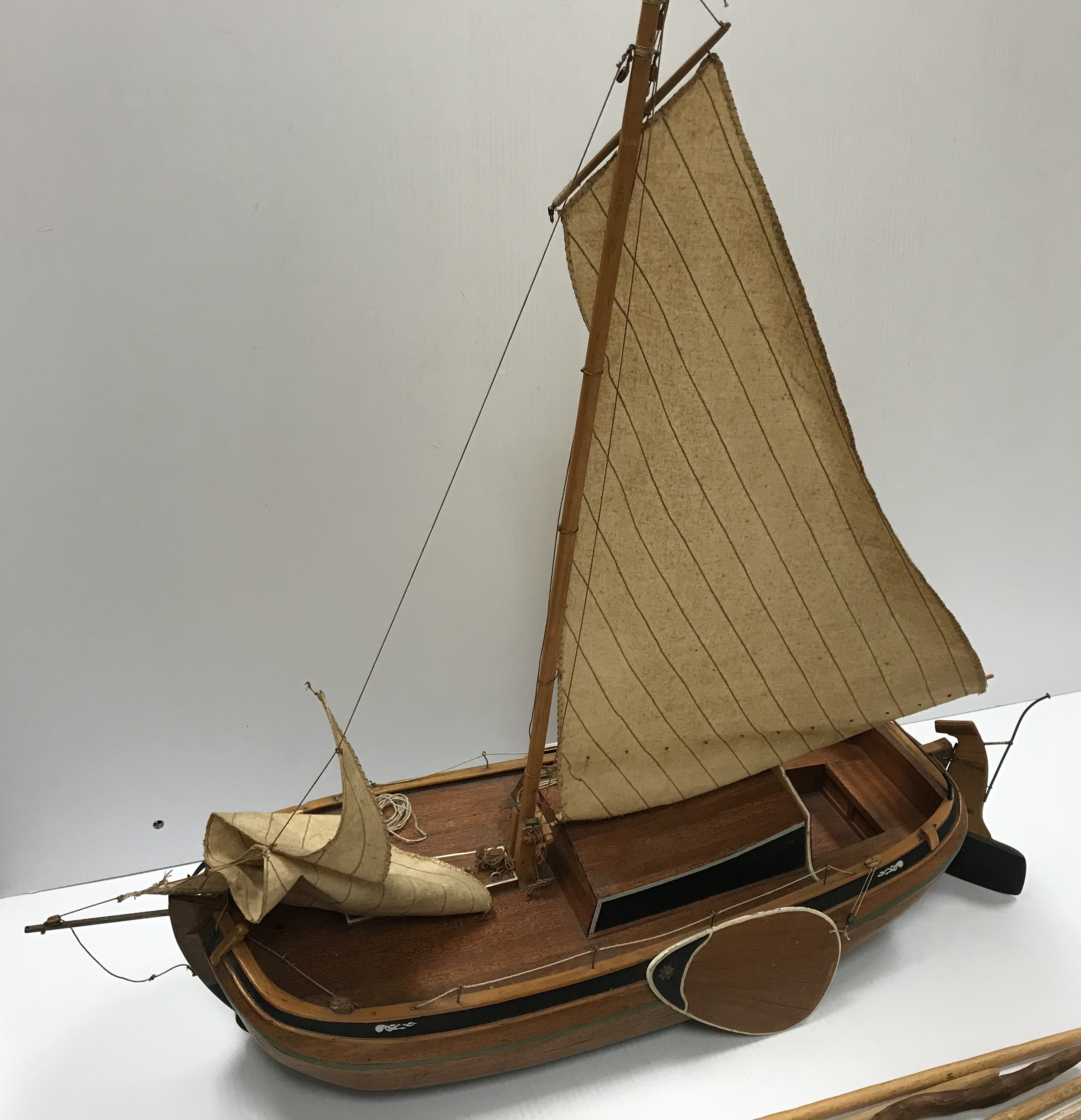 A collection of items to include a model Thames barge, a small African canoe model, - Image 2 of 8