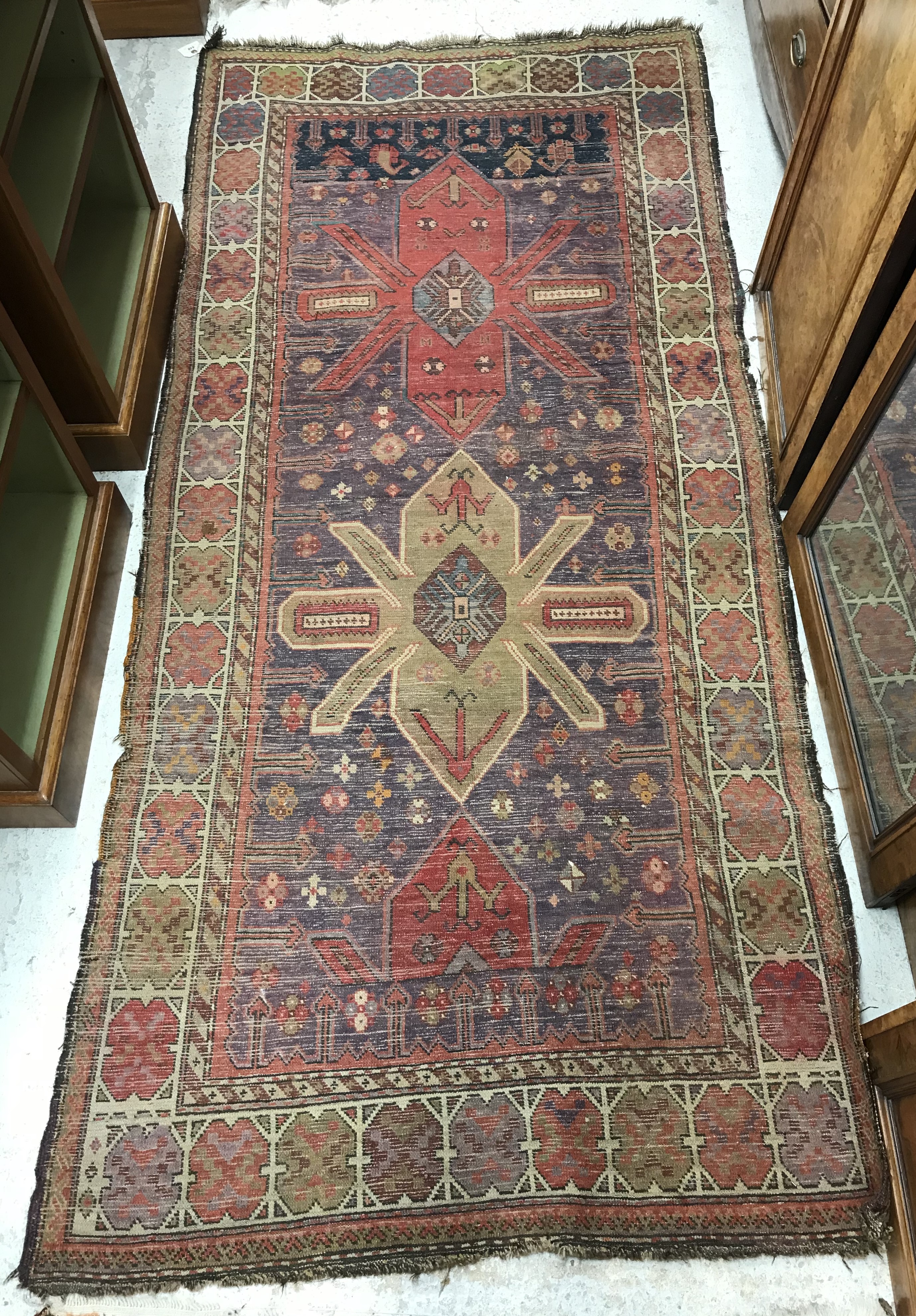 A Caucasian rug, - Image 2 of 2