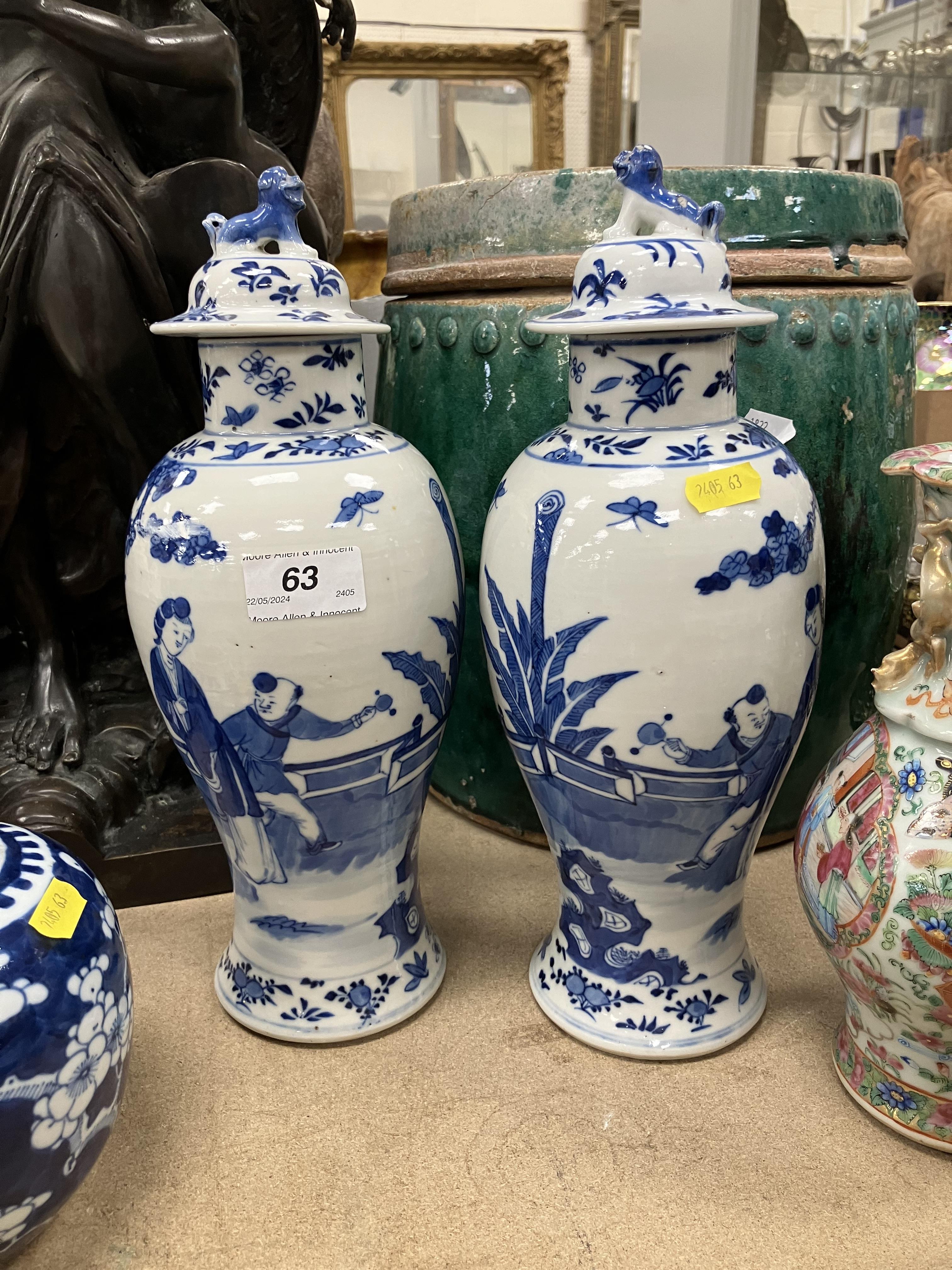 A pair of 19th Century Chinese blue and white baluster shaped vases and covers, - Image 12 of 54