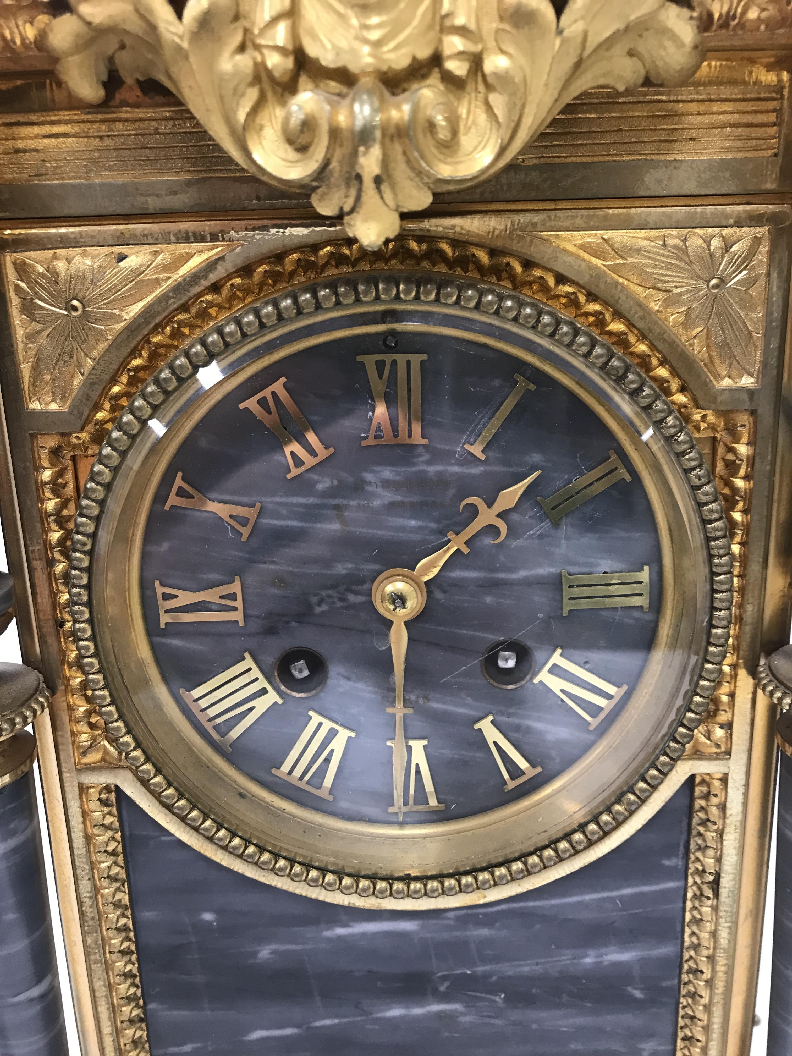 A circa 1900 brass and grey marble cased clock garniture, - Image 2 of 4