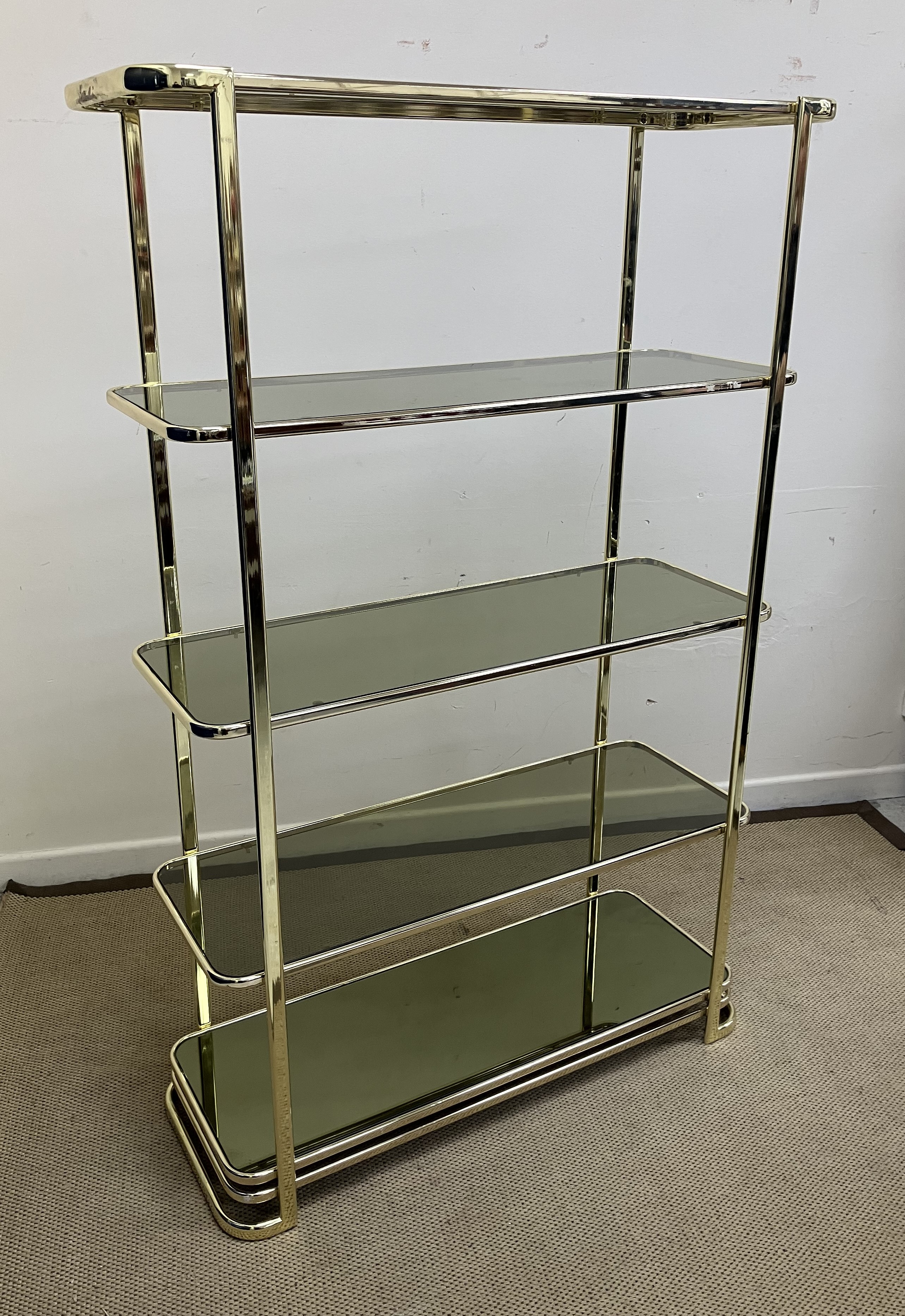 A mid to late 20th Century brass and smoked glass etagere or shelving unit of five tiers with - Image 2 of 2